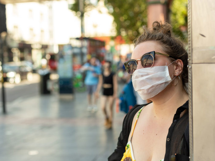 Woman wearing a face mask in the street